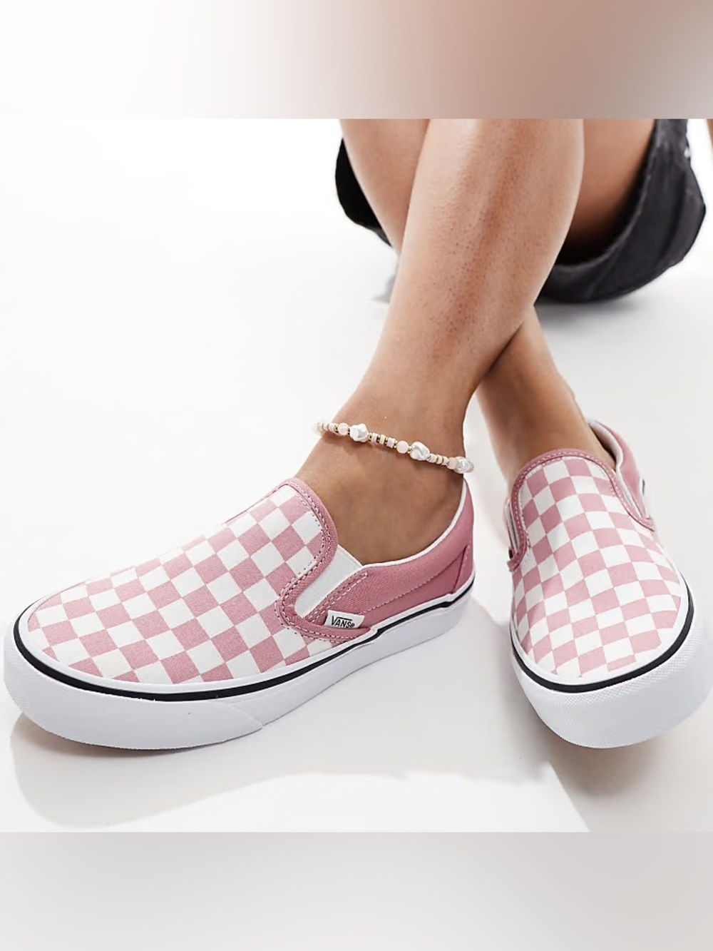 Vans Pink and White Checkerboard Slip-On Sneakers
